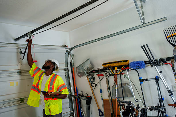 Professional Garage Door Panel Replacement technician working in West Fairview, PA